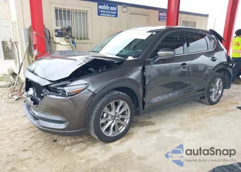 2021 Mazda Cx-5 Grand Touring z USA, uszkodzony, nr VIN JM3KFBDM0M1497154